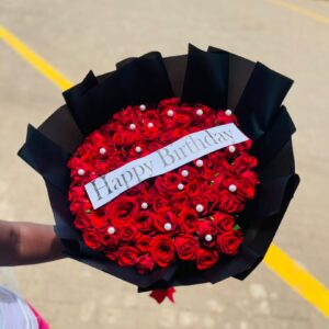 Royal Birthday Blooms – Red Rose Birthday Bouquet with Elegant Black Wrap | Kigali Delivery