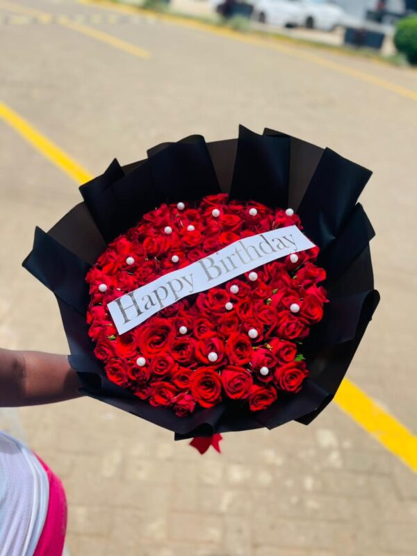 Royal Birthday Blooms – Red Rose Birthday Bouquet with Elegant Black Wrap | Kigali Delivery