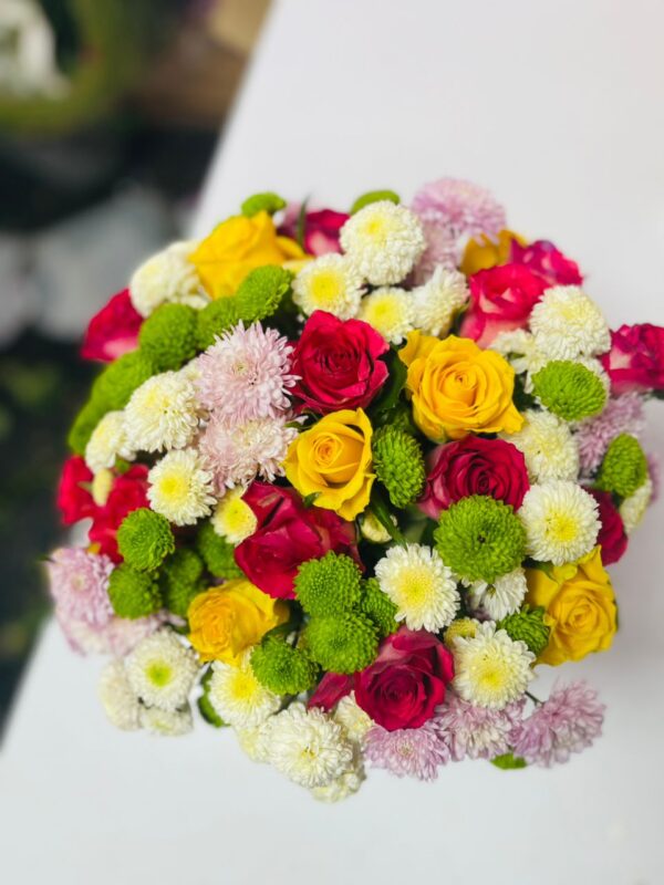 Elegant Mixed Bloom Vase – Kigali Flower Delivery in Stylish Glass